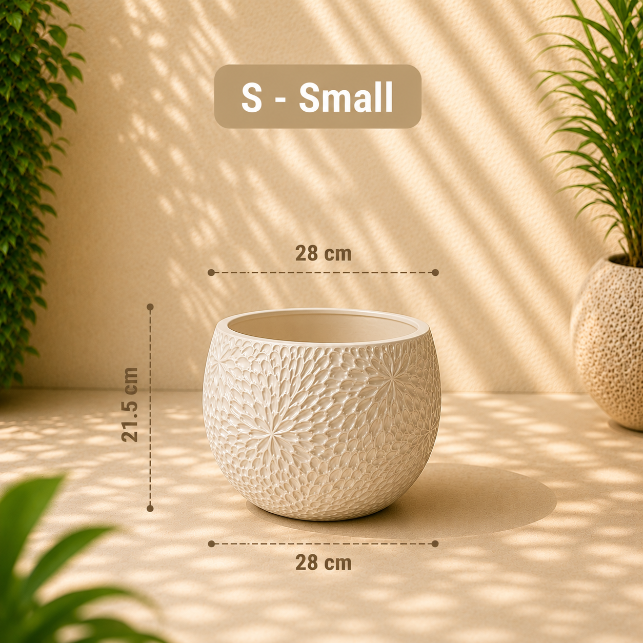A small round textured planter pot shown with dimension callouts reading 28 cm across the top and bottom and 21.5 cm height, on a beige surface with plant shadows.